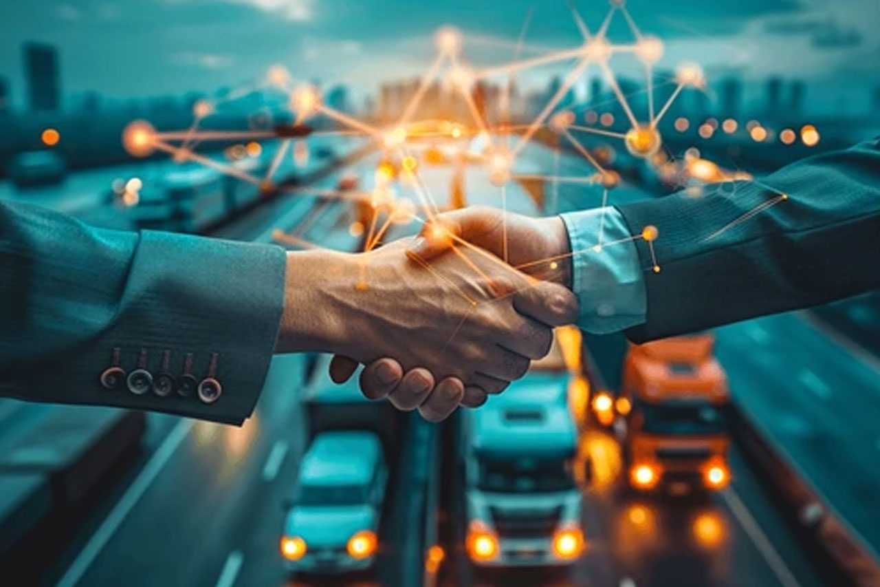 Young business couple make a deal and shake hands